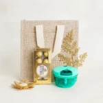 Festive Gift Set with Jute Bag, Chocolates, Diya & Vegetable Chopper-For Diwali Gifting
