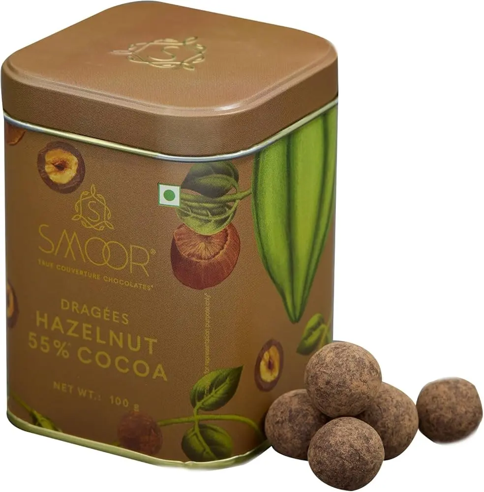 6d6744cb4cce1995ba9532d439618211.webp Smoor Chocolates - DRAGÉES - HAZELNUT 55% COCOA MRP 600 - Image 1