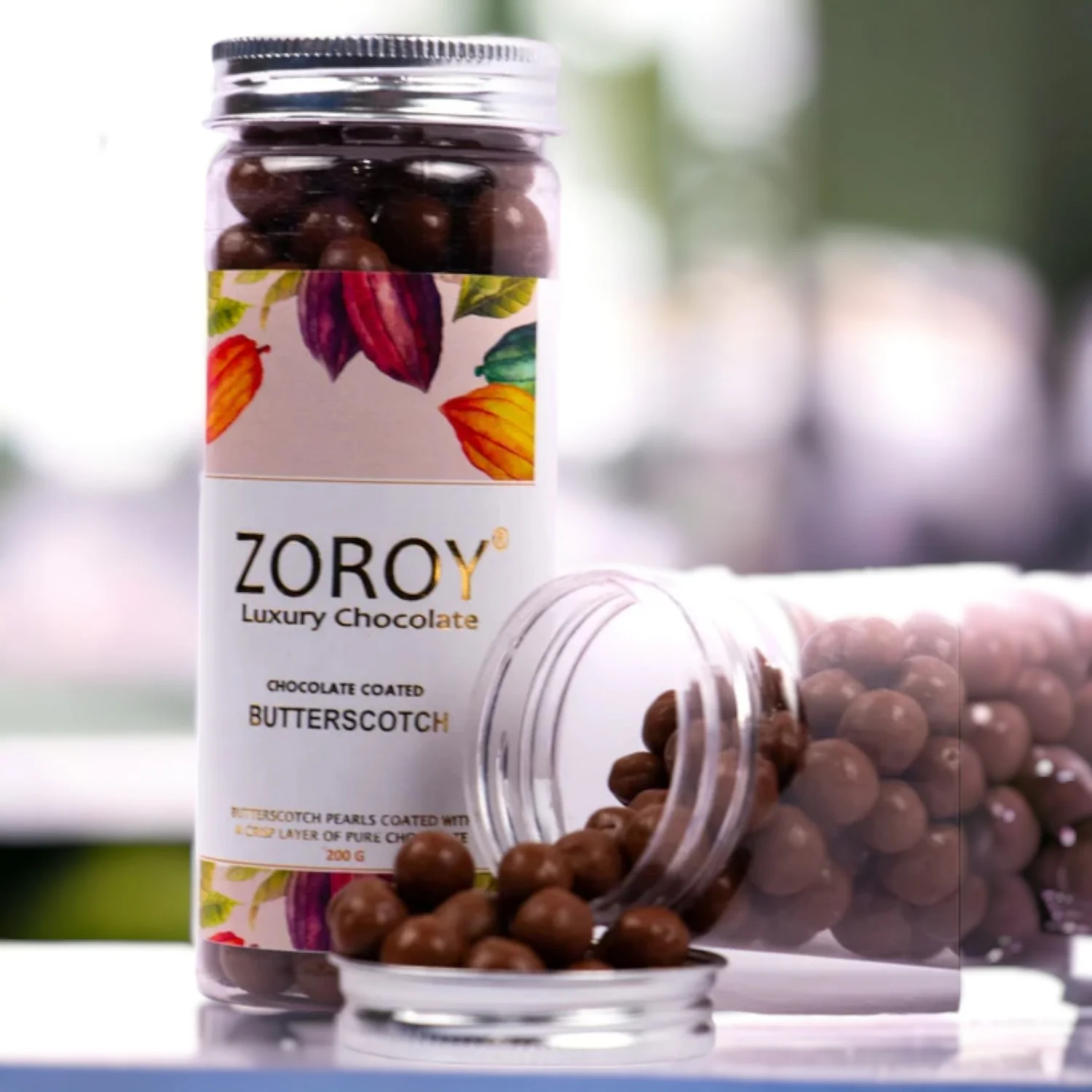 7fd145325ea54231ab1a56553d83cb15.webp ZOROY - CHOCOLATE COATED NUTS - Chocolate Butterscotch 200g - MRP 595 - Image 1