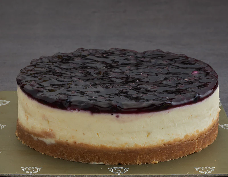 c3f9dc9884e94d6e762f146f8b2577f2.webp Smoor Chocolates - CAKES - BLUEBERRY CHEESECAKE HALF KG - MRP 1533 - Image 1