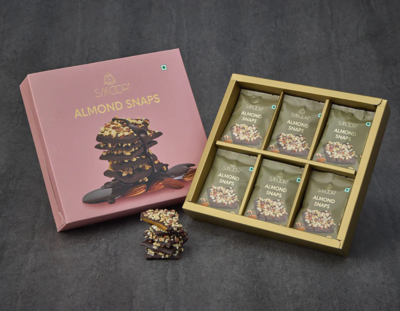 d4528c0fa739aa54727b31b17f61c16a.webp Smoor Chocolates - ALMOND SNAPS Pack of 18 - MRP 700 - Image 1