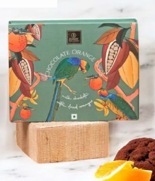 d6d3cf9b961a3384fdd4bac041f65ef6.webp ZOROY - CHOCOLATE DISCS Orange 100G - MRP 595 - Image 1