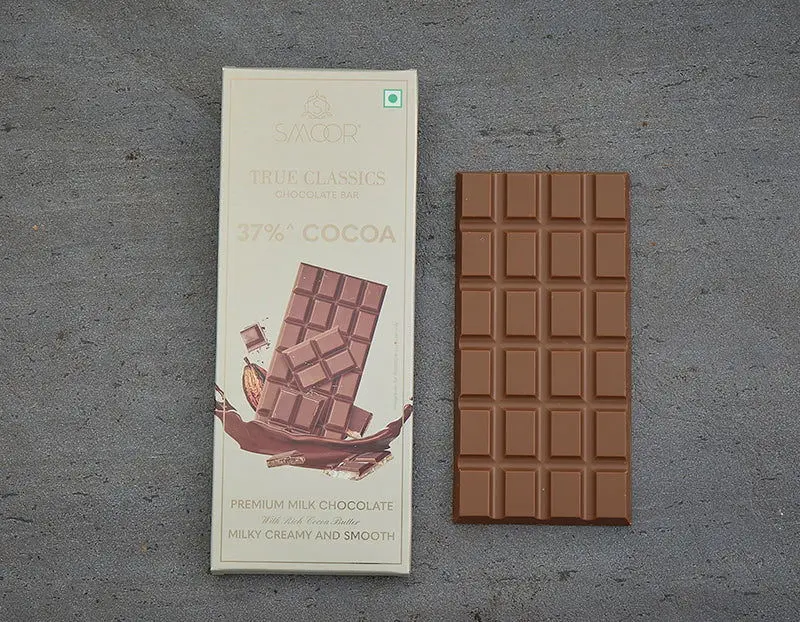ea14dc42369d43a0b8b91764ecc81c2e.webp Smoor Chocolates - TRUE CLASSICS CHOCOLATE BAR - 37% MILK CHOCOLATE BAR MRP 220 - Image 1