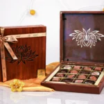 ZOROY - LOTUS LASER WOOD BOX with16 chocolates Signature - MRP 1979