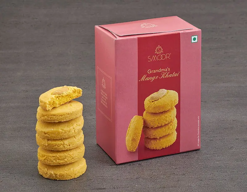 eff833f96f9ba51a8b6449fe01f30113.webp Smoor Chocolates - COOKIES - GRANDMA’S MANGO KHATAI - MRP 175 - Image 1
